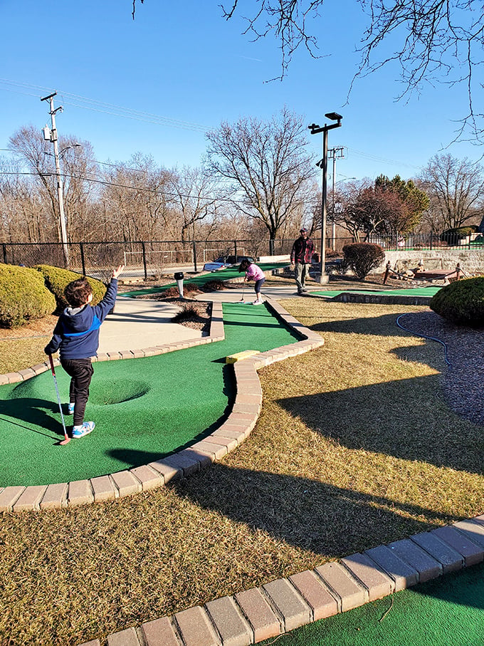 "Fore! Or should I say, 'Boo!'? This mini-golf course is where Tiger Woods meets the Addams Family. Just watch out for the 18th hole – it might just watch you back!"