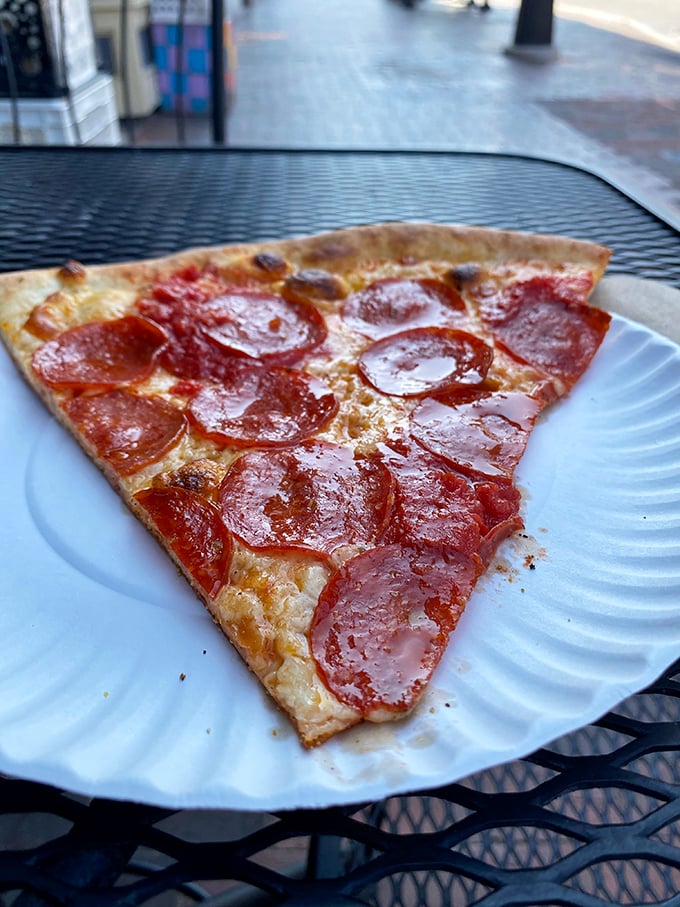 Behold, the slice that launched a thousand cravings! This pepperoni beauty is so photogenic, it could break Instagram. #PizzaGoals