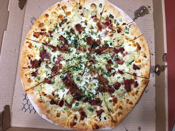 Ladies and gentlemen, I present the pulled pork pizza - where BBQ meets Italy in a mouthwatering tango. It's so good, you might forget to breathe between bites.