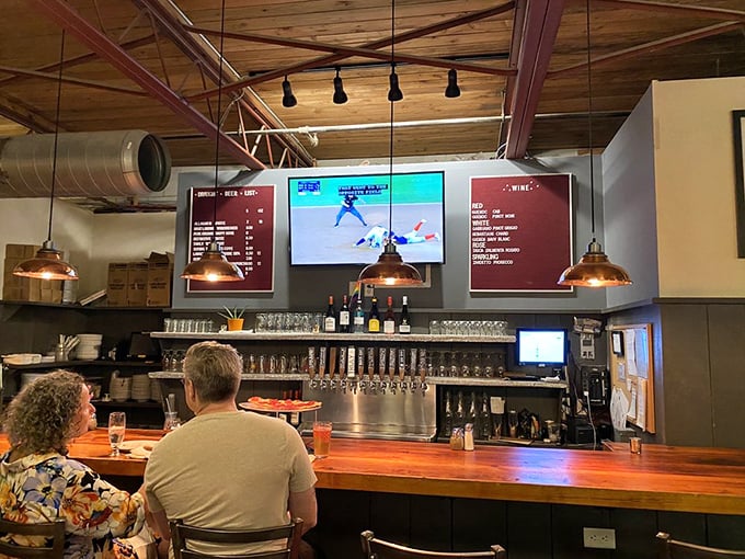 OTTO's bar: Where beer taps flow like rivers and wine glasses clink in pizza-pairing harmony. It's an oasis for thirsty adventurers on a quest for the perfect slice.