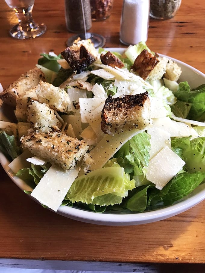 Who said you can't make friends with salad? This Caesar is so epic, it could conquer Rome. Et tu, crouton?