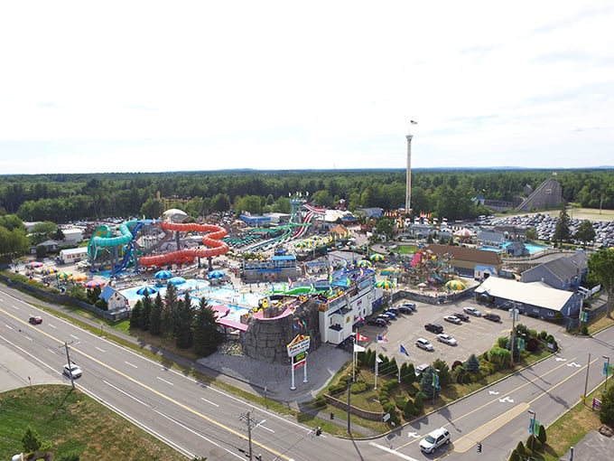 From above, Funtown Splashtown USA looks like a painter spilled their most vibrant colors across the Maine landscape. Time to dive in!