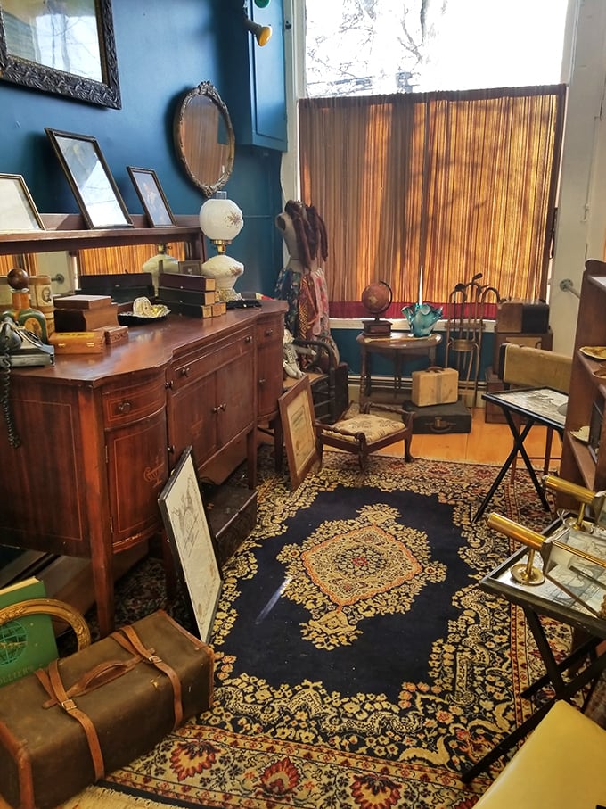 Mad Men meets Maine woods in this cozy corner. Don Draper would feel right at home sipping Old Fashioneds on that plush rug.