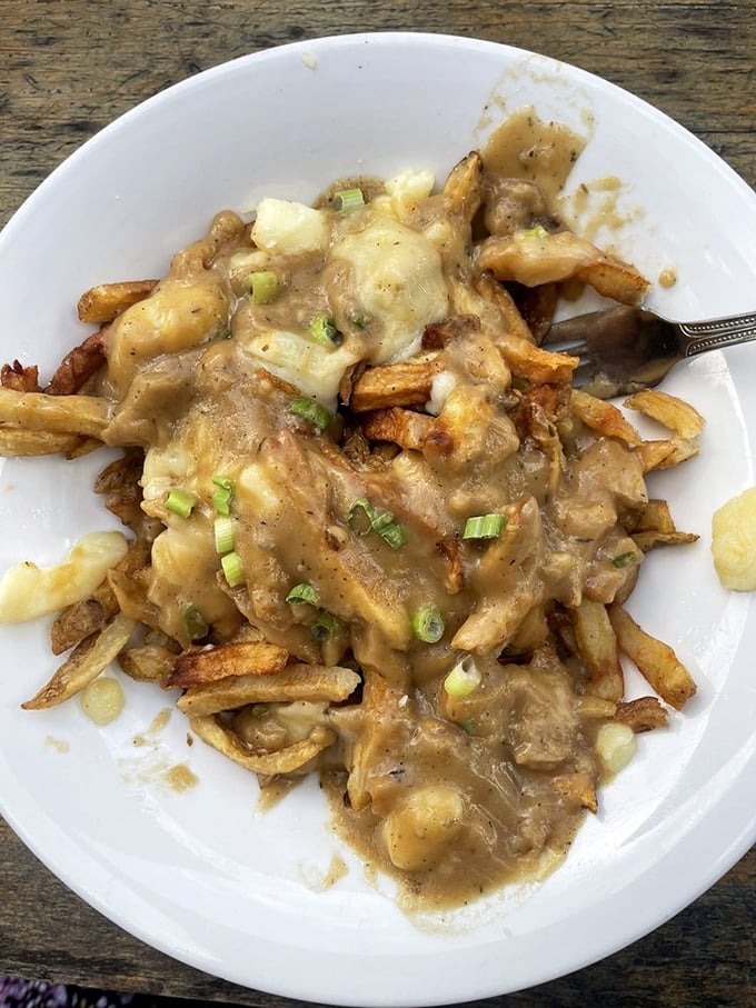 Gravy so good, you'll want to swim in it! This poutine is messier than a toddler's art project, but infinitely more delicious.