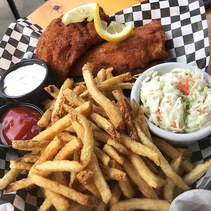 A feast fit for a sea captain! This fish and chips platter comes with more sides than a geometry textbook, and twice as satisfying.