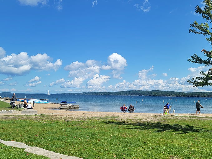 Beach bliss in full swing! Clinch Park's shoreline is dotted with happy beachgoers living their best "Out of Office" lives.