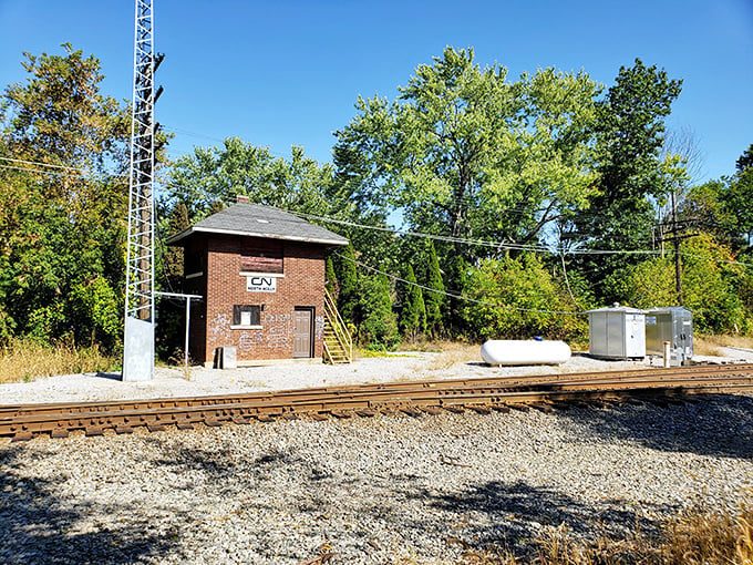 This isn't your average garden shed. It's a slice of railroad history, standing tall and proud like a Midwest Stonehenge.