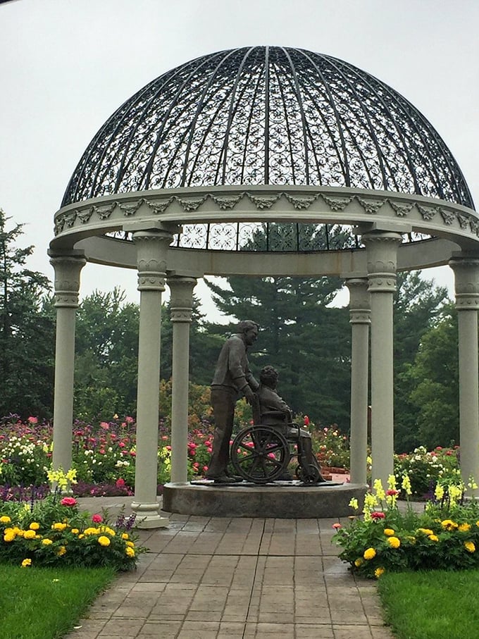 Compassion in bronze: This touching sculpture reminds us that gardens, like kindness, are for everyone to enjoy.