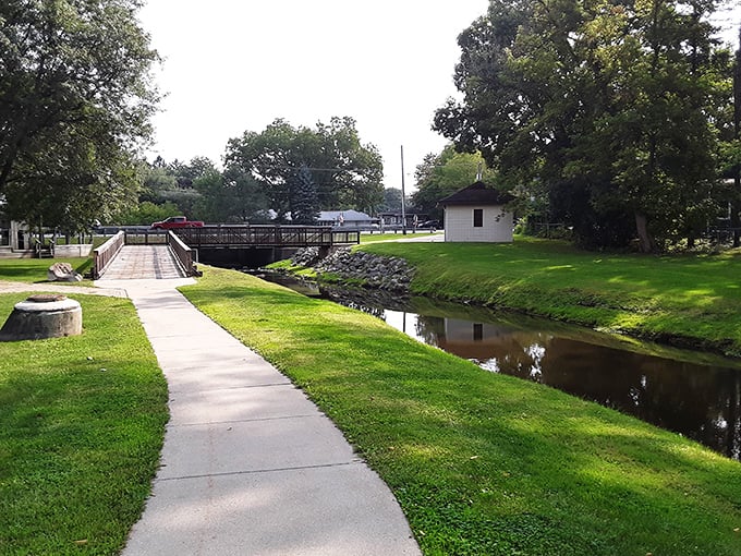 Nature's playground in the heart of town. A serene creek meanders through lush greenery, offering a peaceful respite from the bustling streets nearby.