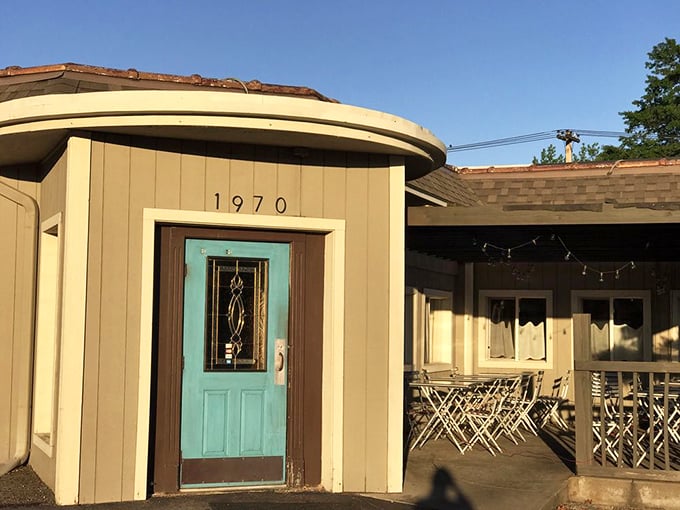 The gateway to gastronomic bliss: This blue door isn't just an entrance, it's a portal to flavor town!