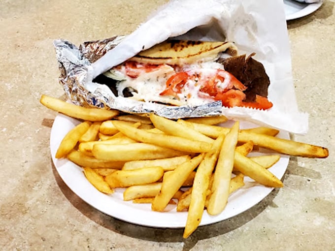 Gyros: Where meat the pita! This classic handheld feast comes with a side of golden fries that could make even Midas jealous.