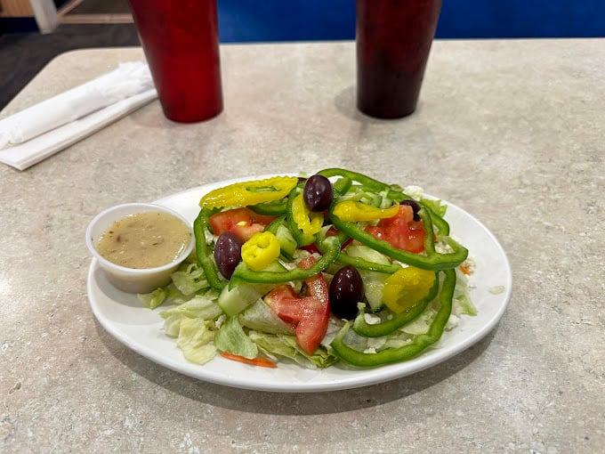 A salad so fresh and colorful, it could double as a still life painting. Eat your greens and pretend you're dining on a sun-drenched Mykonos patio.