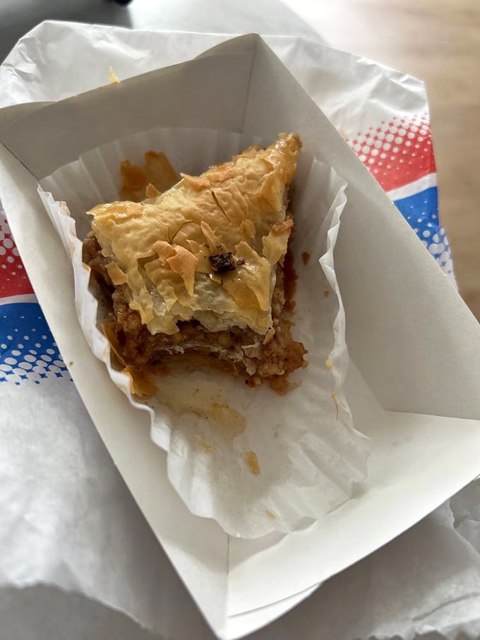 Baklava: Where phyllo dough dreams come true. This honey-soaked slice of heaven is sweeter than Aphrodite's kiss.