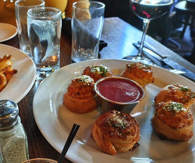 Garlic knots: the opening act that threatens to steal the show. Paired with marinara, they're a dynamic duo of deliciousness.