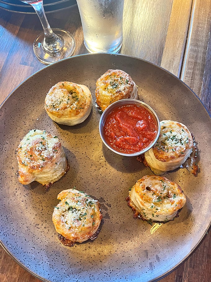 Garlic knots that could make a vampire reconsider. These golden nuggets of joy are worth every savory, buttery bite.