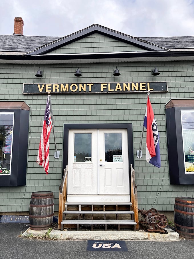 Step right up to flannel heaven! With flags waving and barrels standing guard, this entrance promises a warm embrace of soft, patterned goodness.