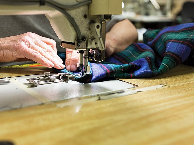 Craftsmanship in action! Watch as skilled hands transform simple fabric into wearable works of art. It's like ASMR for your eyes!