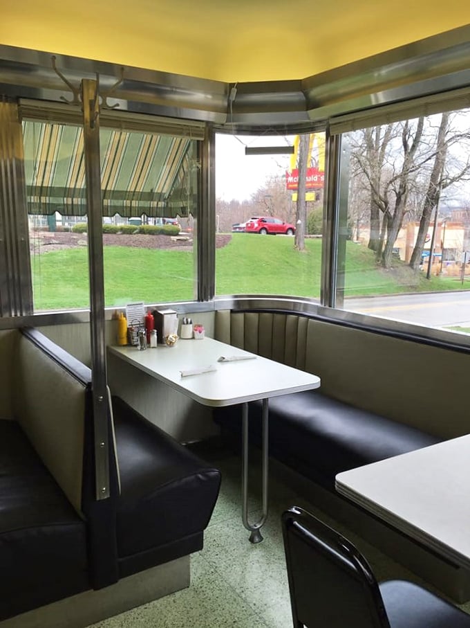 Booth sweet booth! This cozy corner is the perfect spot for solving the world's problems or deciding between pancakes and waffles.