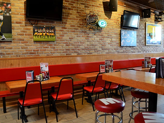 Step into a time capsule of tasty treasures. Exposed brick walls, sports memorabilia, and cozy booths set the stage for a delicious trip down memory lane.