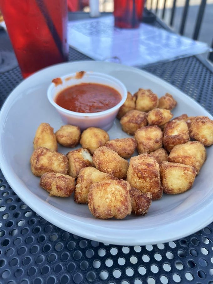 Cheese curds: Wisconsin's edible stress balls. These golden nuggets of joy are the perfect way to forget about your troubles, one squeaky bite at a time.