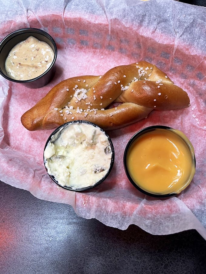 Twist and shout! This warm, pillowy pretzel is the carb hug you didn't know you needed. Paired with dipping sauces, it's a salty-sweet symphony.