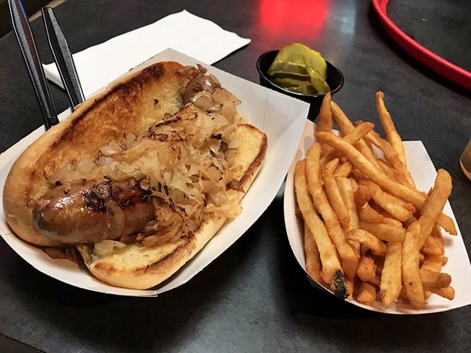 A sausage fest worth celebrating! This brat nestled in a pillowy bun, topped with sauerkraut, is a Midwest classic that'll have you yelling "Prost!"