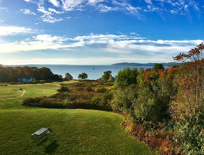 Rolling hills meet Penobscot Bay in a scene so peaceful, even the clouds seem to slow down for a better look. Photo credit: @E_H55711