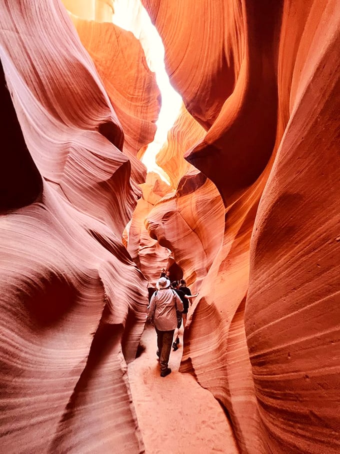 Nature's own funhouse mirror! Swirling sandstone walls create a psychedelic dreamscape that'll make you question reality.