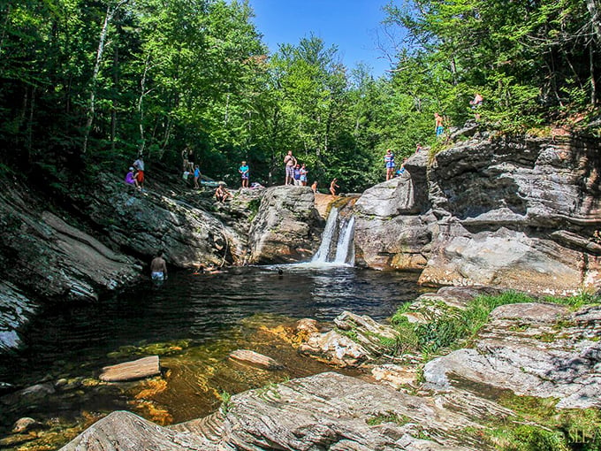 Crystal-clear waters surrounded by sun-warmed rocks. It's like nature designed the perfect lounging spot just for you.