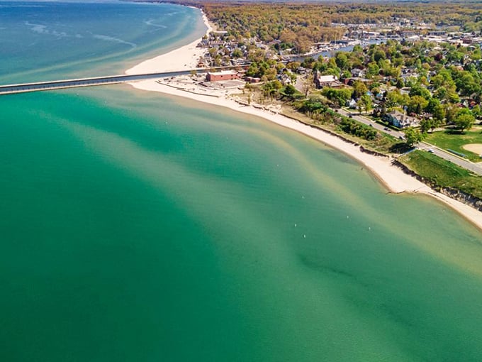 South Haven: Where the lighthouse stands guard and the beach beckons like a siren's call. Photo credit: Carefree Boats