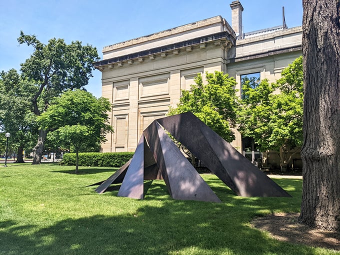 "UMMA's outdoor art: Proof that not all campus workouts involve dumbbells. These sculptures flex some serious creative muscle!"