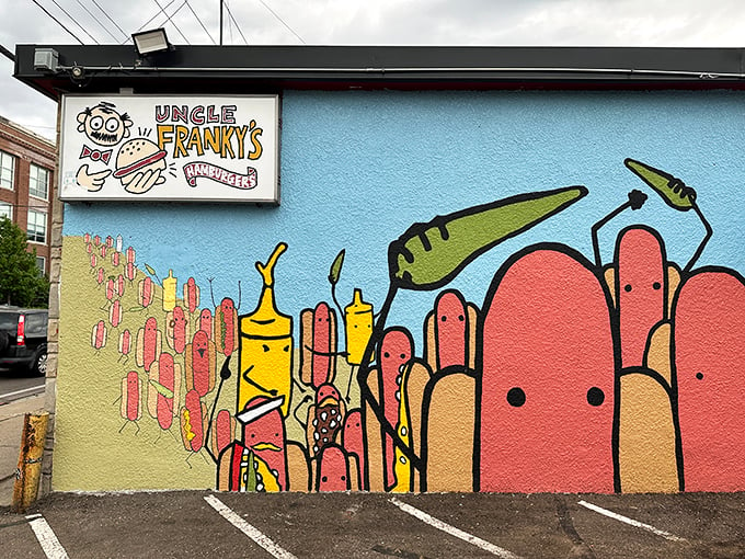 Cartoon condiments come to life on this vibrant mural, setting the stage for a playful culinary adventure inside.