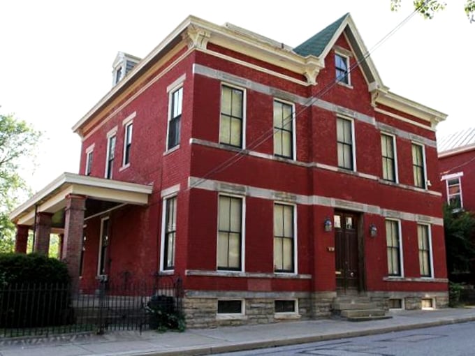 Daytime disguise: Don't let the cheery red exterior fool you – this rectory has a reputation for after-dark frights.