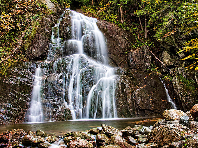 Nature's own waterfall masterpiece! Moss Glen Falls cascades down like a liquid staircase, inviting you to climb – with your eyes, of course.