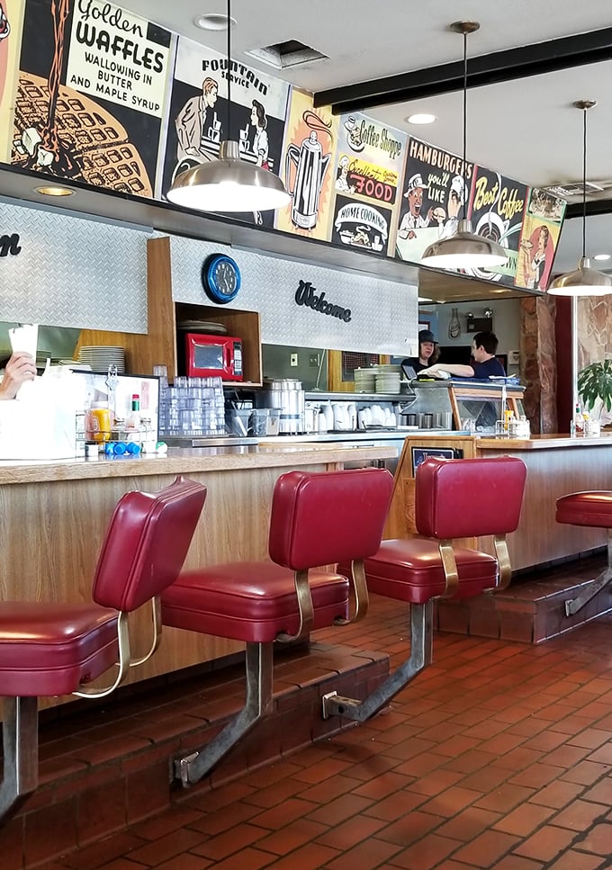 Red booths, gleaming tables, and the promise of good eats. If Norman Rockwell painted diners, this would be his masterpiece.