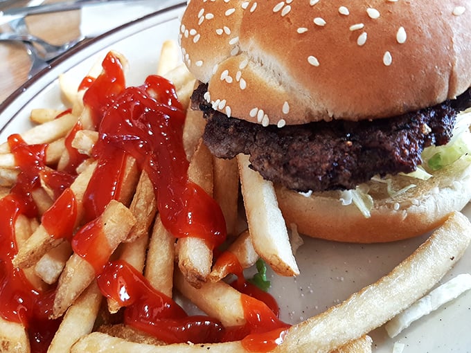 Burger bliss achieved! This all-American classic, paired with crispy fries, is the stuff food dreams are made of.