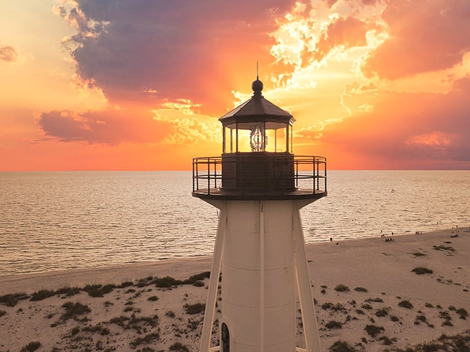 Mother Nature's light show! The sunset paints the sky, giving our lighthouse some serious competition in the beauty department.