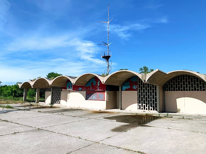 Retro chic meets beachside bliss: These quirky structures are like time capsules from a bygone era of summer fun.