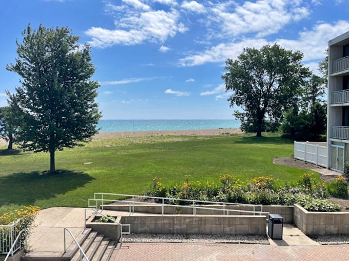 Room with a view: Lake Michigan plays peekaboo through the trees, offering a daily dose of blue therapy.