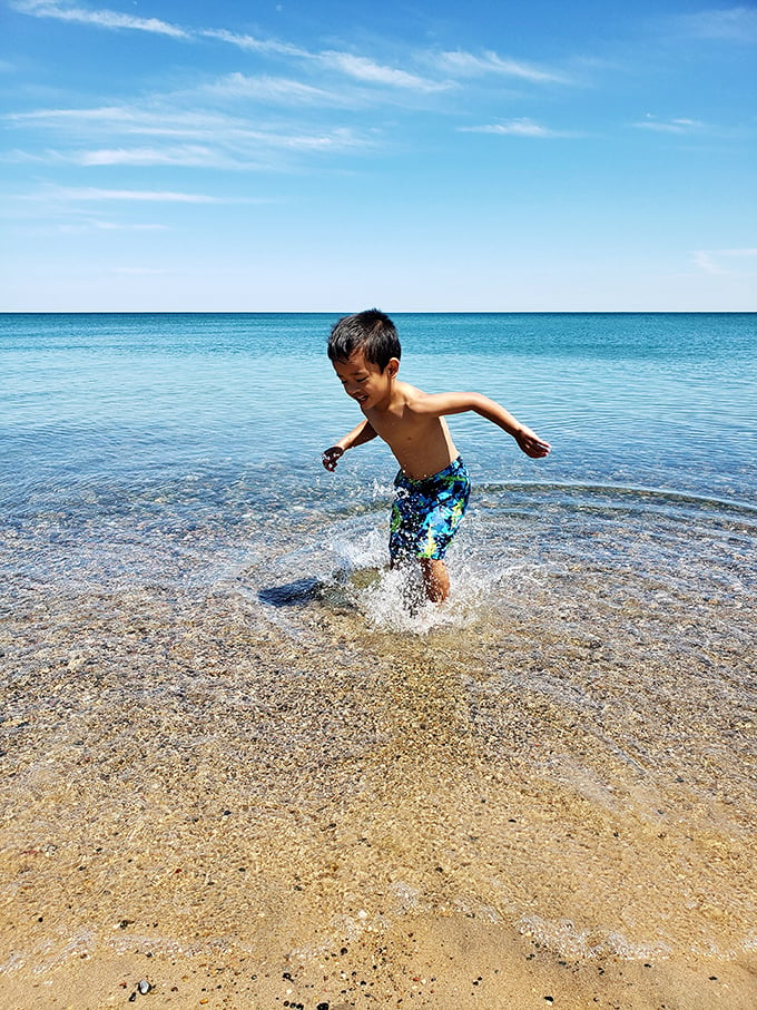 Splash zone ahead: This little water warrior is living every kid's summer dream – endless waves and zero homework.