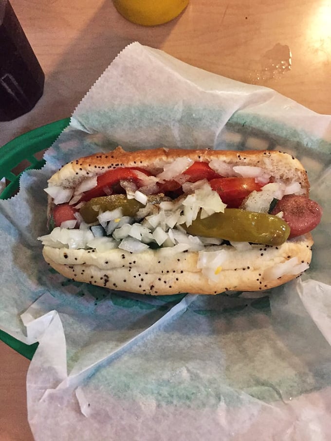 Chicago dog, oh my! This Windy City wonder is dressed to impress with more toppings than a Midwestern potluck. No ketchup allowed!