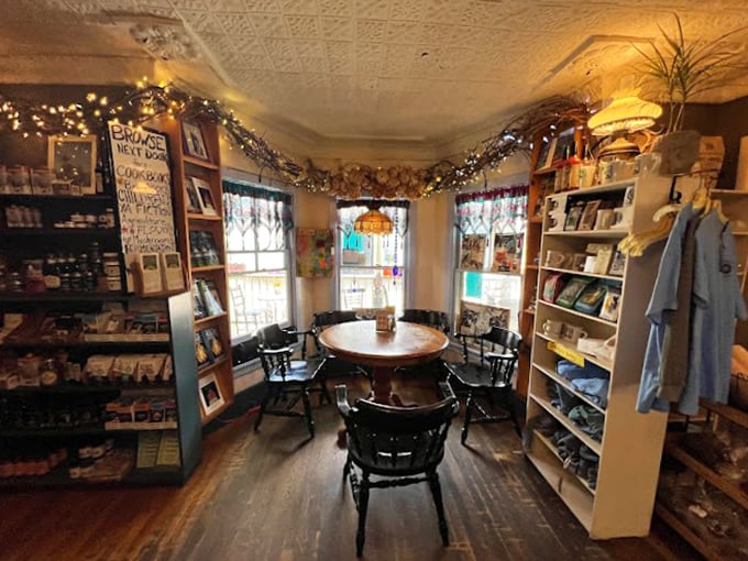 A cozy nook straight out of a fairy tale, complete with twinkling lights. It's like the Room of Requirement, but for bookworms and coffee addicts.