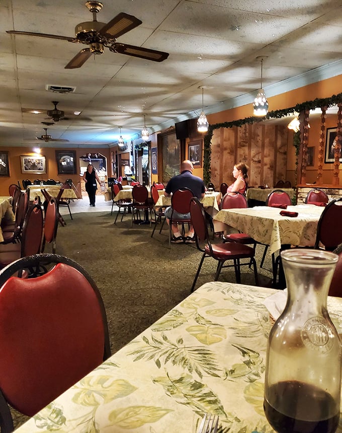 Step into a time warp where comfort meets nostalgia. Dreamland's interior is a warm embrace of wood paneling, cozy booths, and memories waiting to be made.