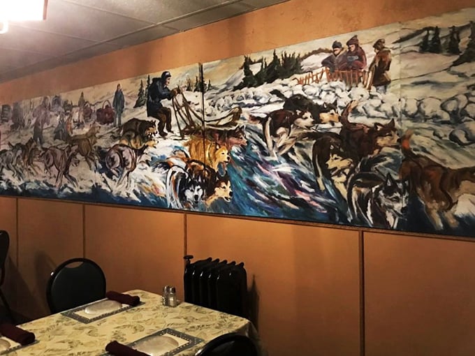 Art that feeds the soul while you feed your appetite. This mural brings the great outdoors inside, no bug spray required.