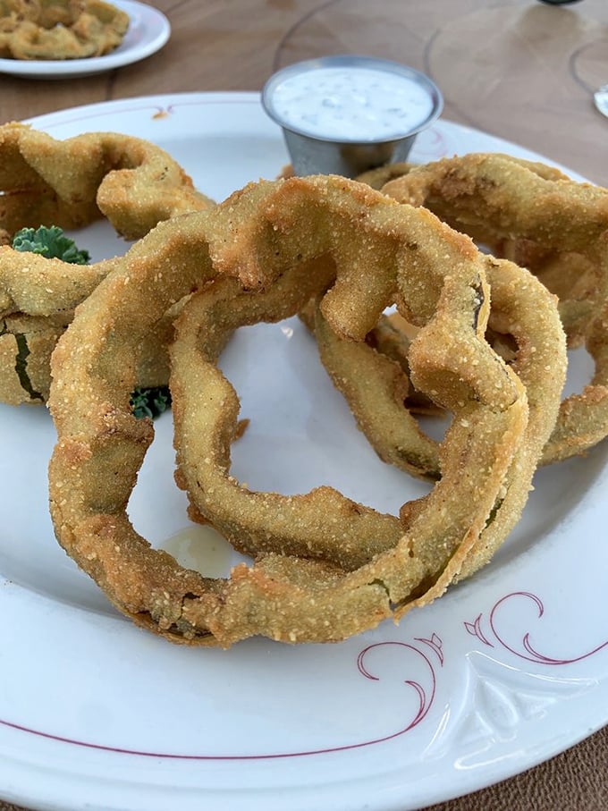 Crispy, golden rings of joy. These onion rings aren't just a side dish; they're edible halos sent from comfort food heaven.