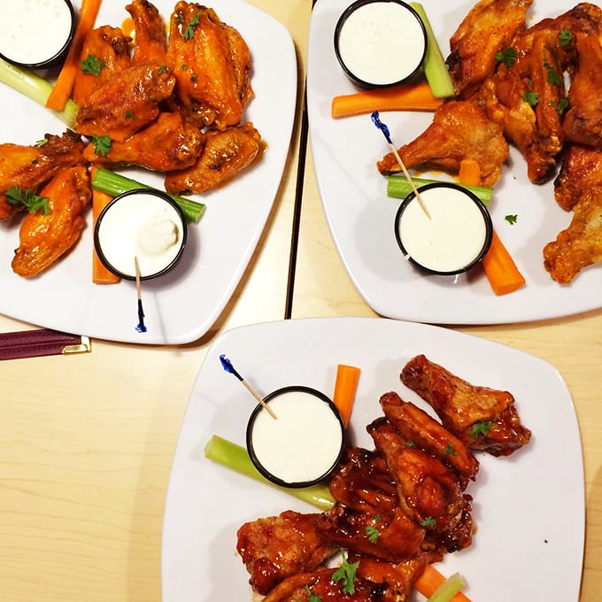 A trifecta of wing perfection! Mild, hot, or maple-glazed – it's like a flavor rainbow landed on your plate.