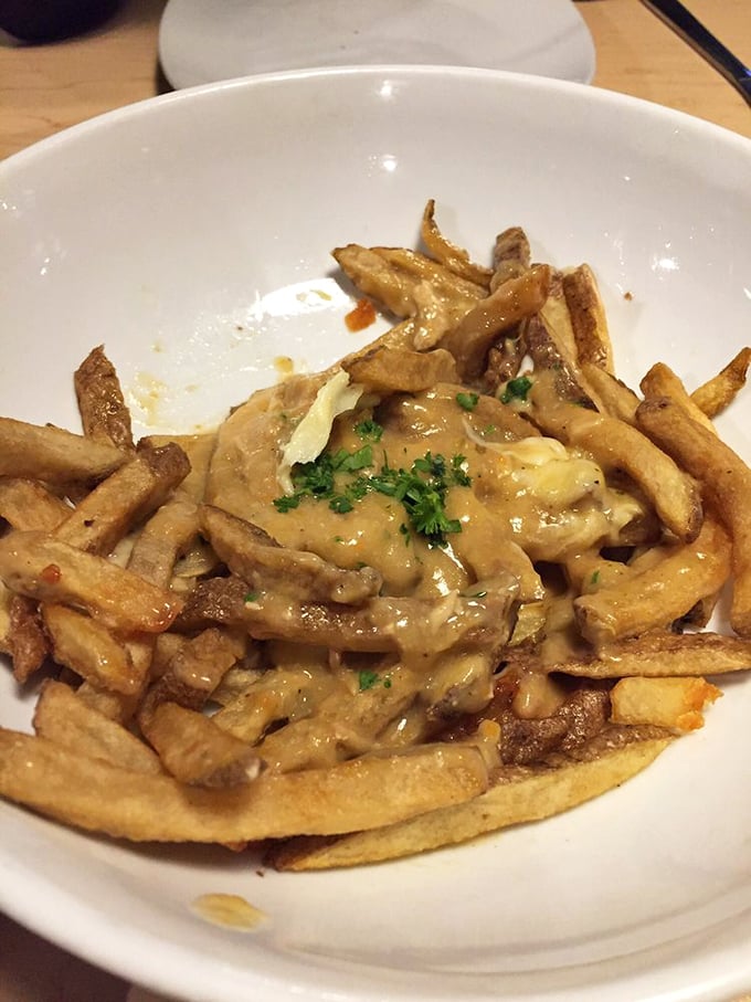 Poutine that puts the 'ooh' in gooey! It's a delicious mess that'll have you licking the plate clean.