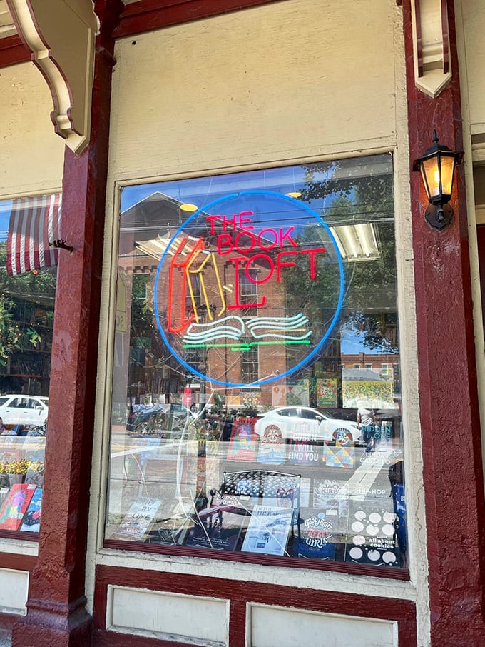 Let there be books! This neon sign glows like a beacon for night owls seeking their next literary fix.