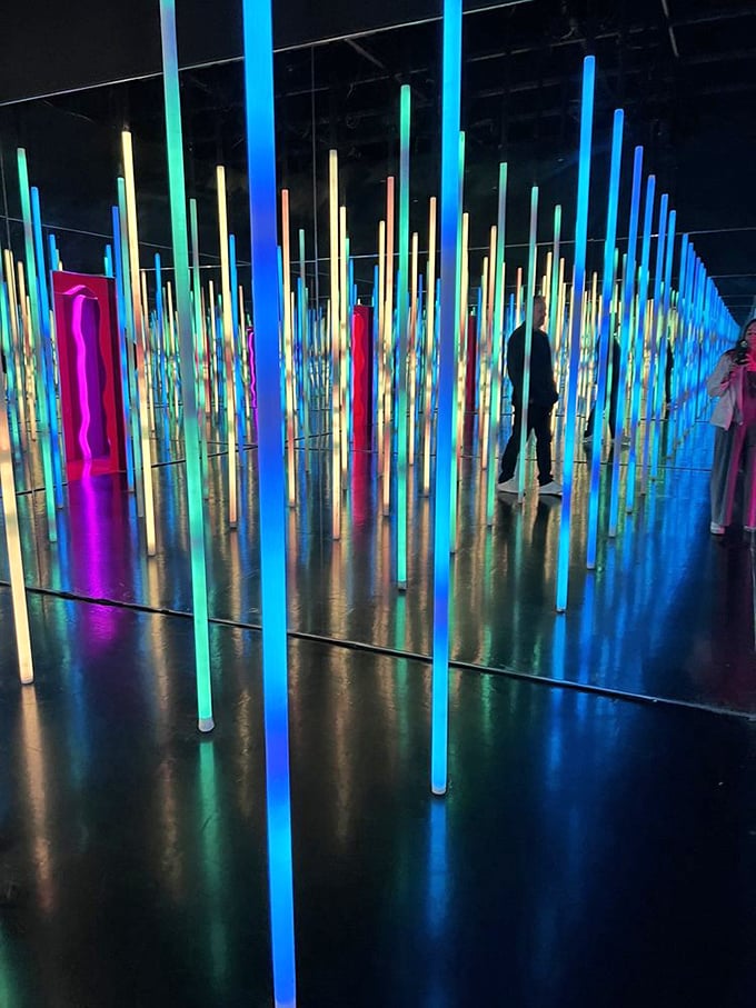 "Lost in a sea of neon reeds? It's not a rave, it's art! This forest of light makes for some truly enlightening selfies."