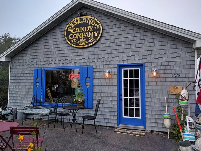 Blue trim, inviting bench, and promises of sugary delights. It's like stepping into a confectioner's daydream.